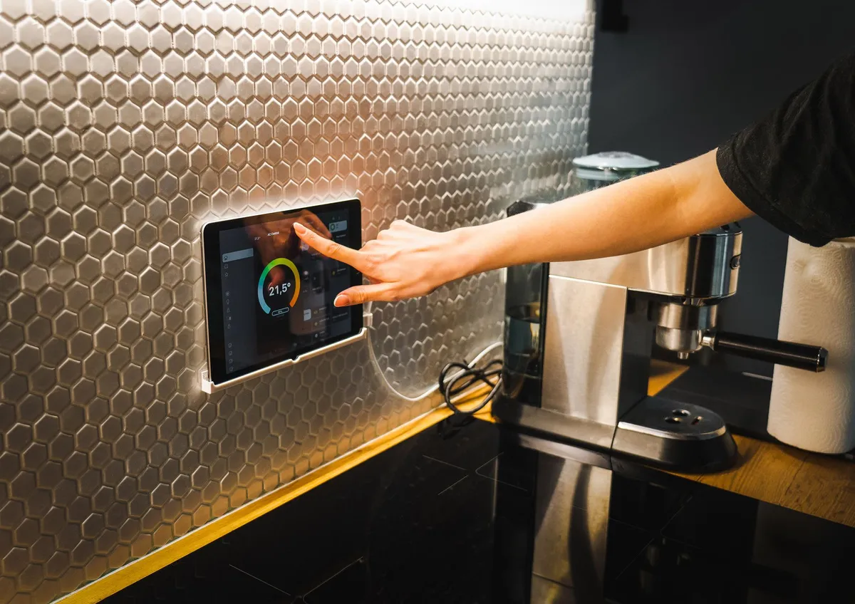 Interior design technology tools on a tablet showing room visualization software