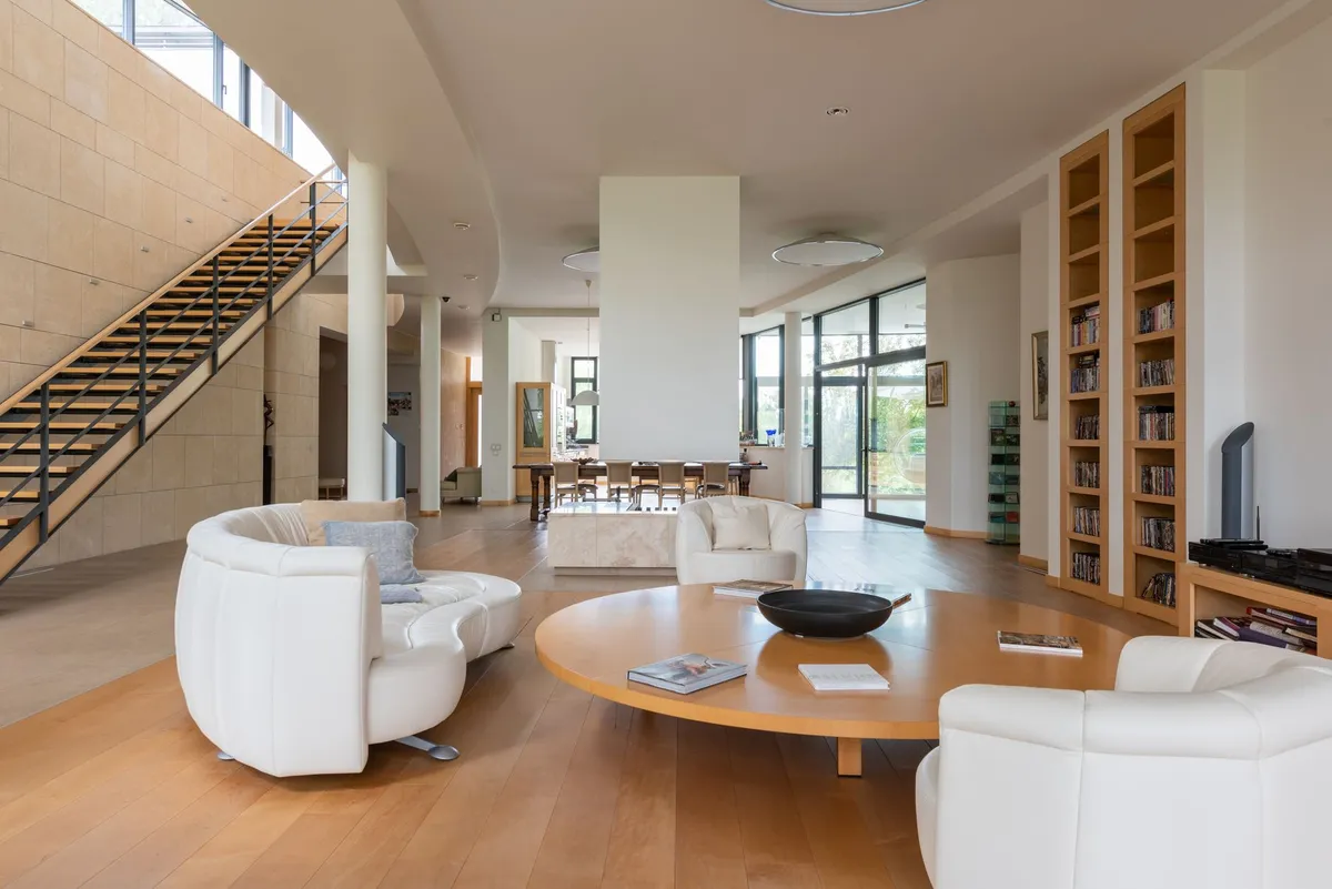 Before and after comparison showing AI-powered room renovation transforming an outdated living space into a modern interior
