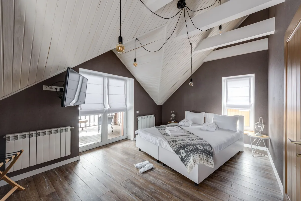 Airbnb-ready bedroom with cohesive Scandinavian design and quality bedding