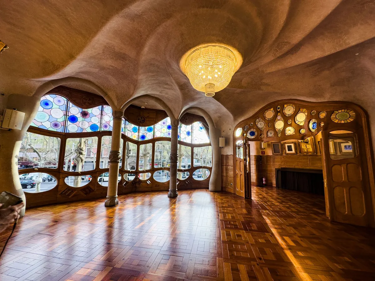 Art Nouveau bathroom with botanical tile work and organic curved fixtures