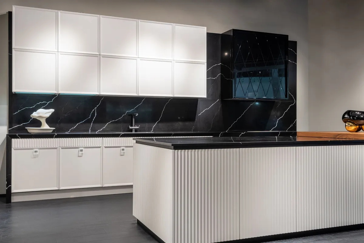 Kitchen with open floating shelves replacing upper cabinets, modern light fixtures