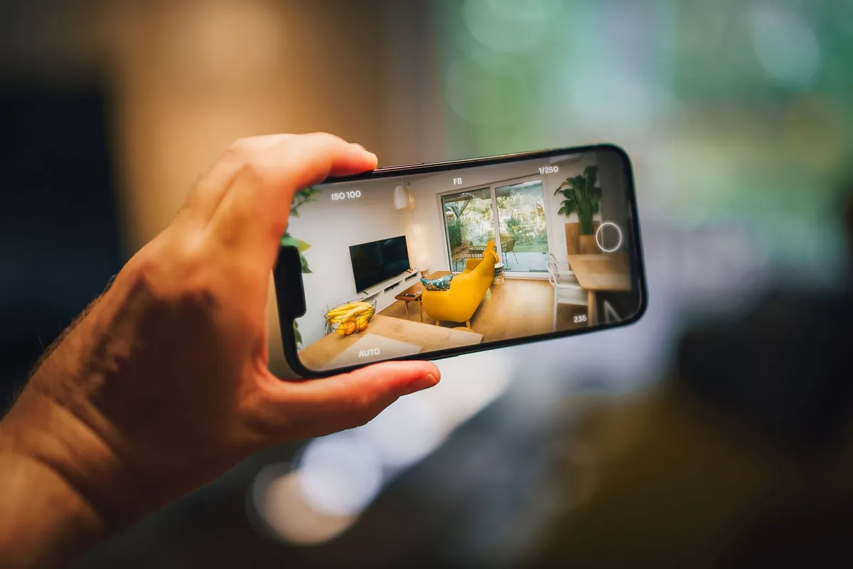 Interior design app comparison showing AI-generated room designs on mobile devices with different style options