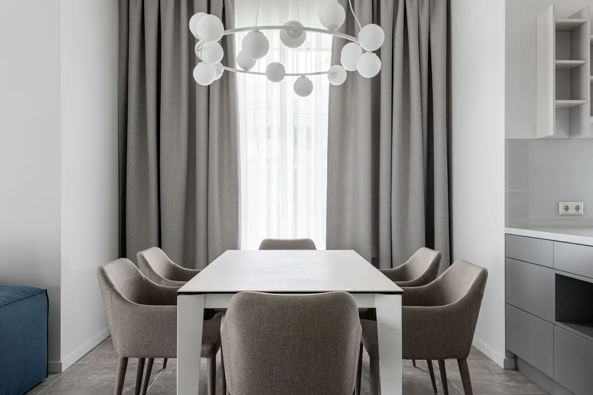 Bright dining room with elegant table setting and natural light