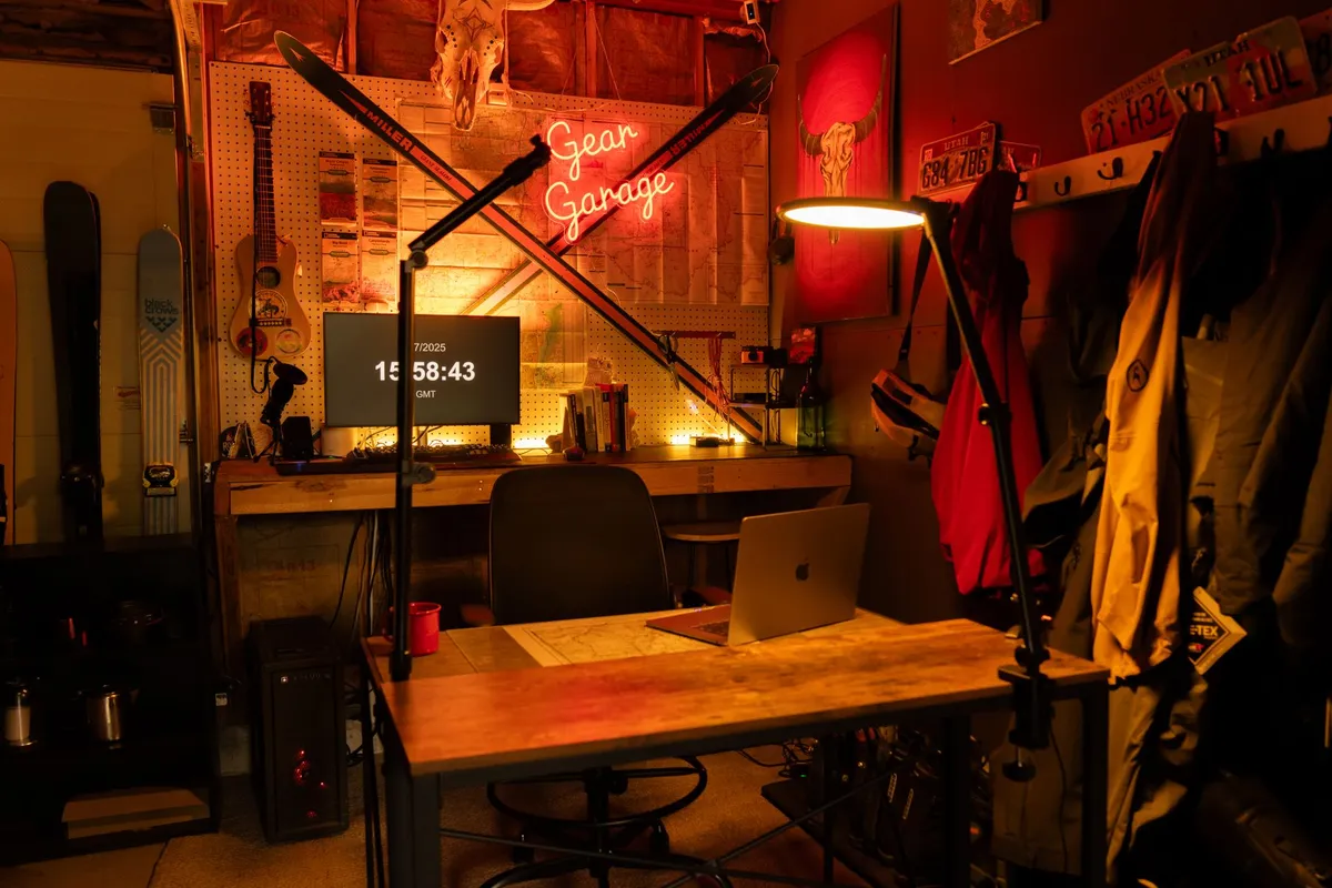 Converted garage home office with drywall insulation built-in desk and natural lighting