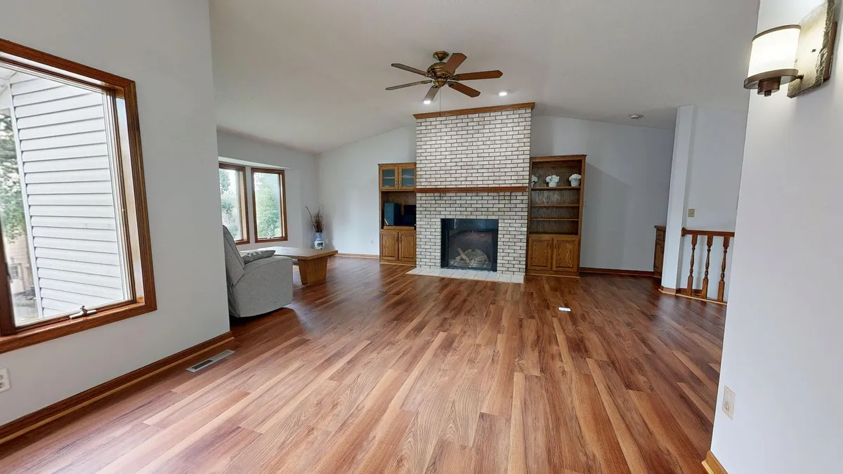 Affordable living room makeover with area rug and updated lighting