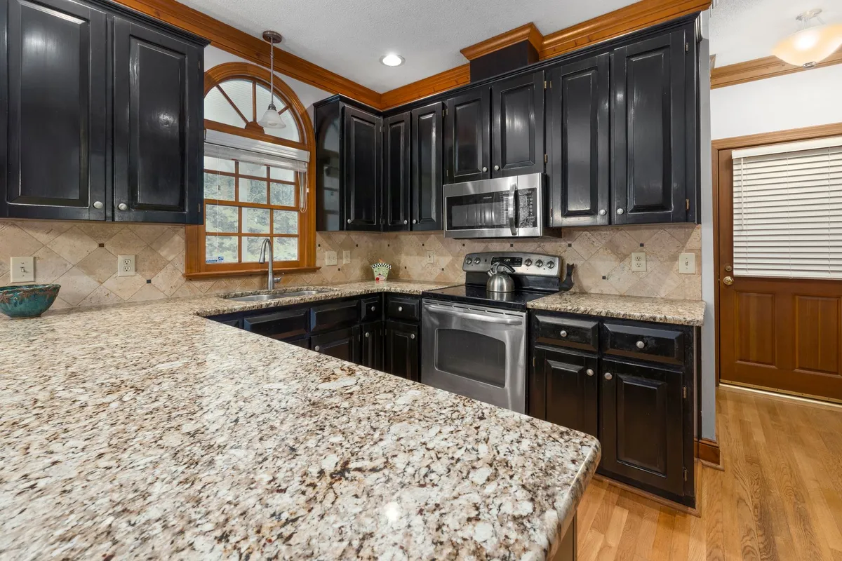 Kitchen remodel budget worksheet with cost categories and percentage breakdowns