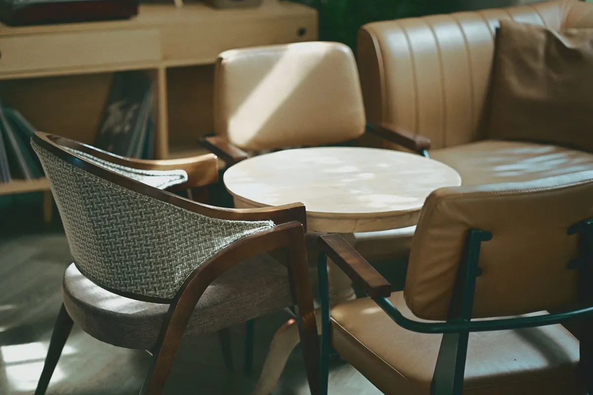 Mid-century dining room with tulip table, wishbone chairs, and walnut sideboard