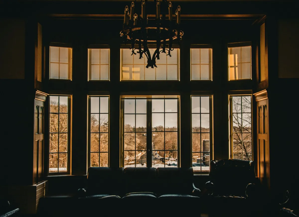 Winter home renovation inspiration showing a bright cozy interior with fireplace warm rugs and layered winter decor